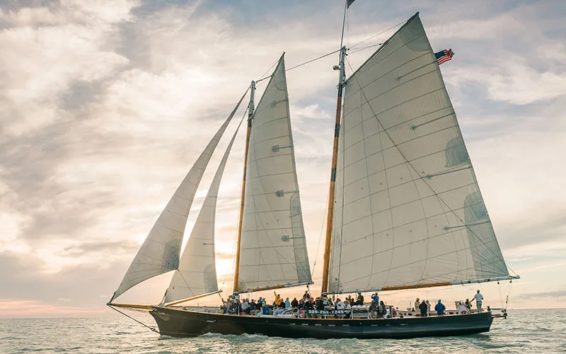 KeyWest_Champagne-Sunset_Slider-11 Schooner America 2.0 sailing in the Ocean in Key West Florida