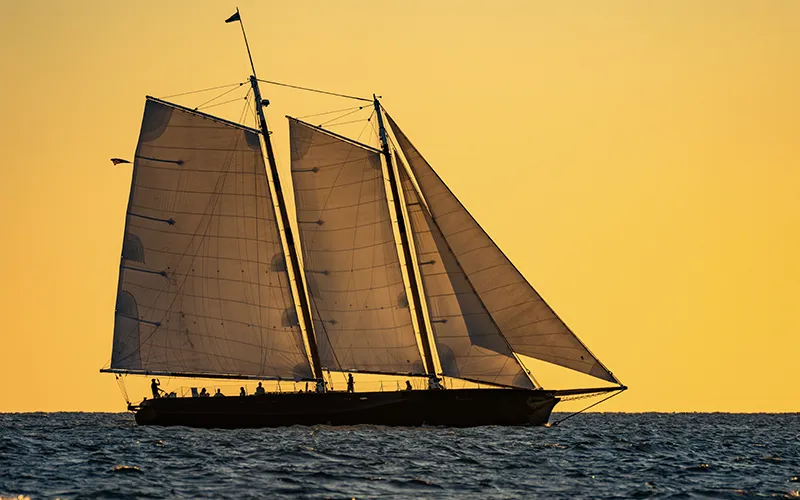 ChristmasSunset3 Schooner America 2.0 sailing at sunset in Key West